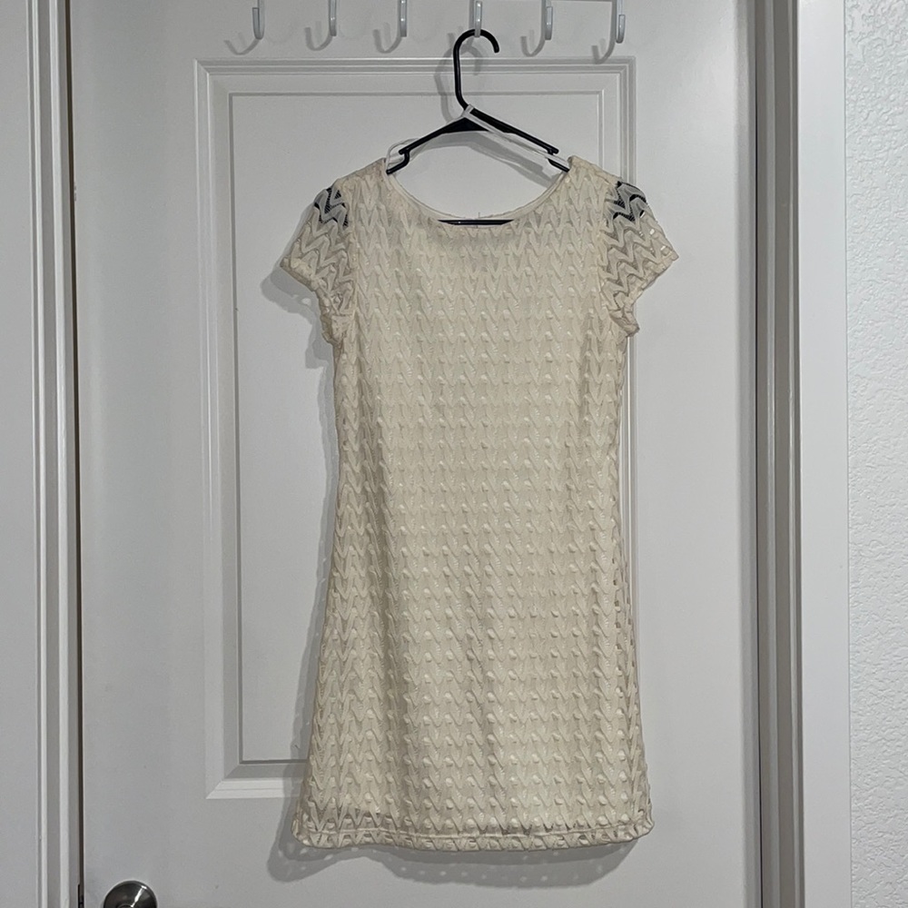 Cream color, mini dress.